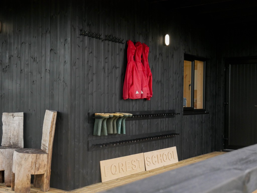 Abbeyfields Outdoor Education Centre welly rack and 'Forest School' sign